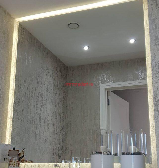 A downstairs toilet mirror we did which really created space with led lighting for great ambiance. Marina Village Greystones Co Wicklow.