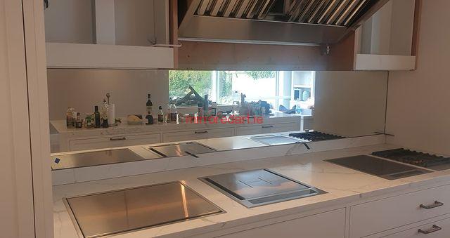 A mirrored splashback we completed for venturadesign in a fabulous private project in Castleknock Dublin. Amazing how much light and space can be created by a mirror.