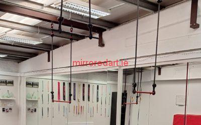 A large wall of mirror extending over 8 feet in height and 35 feet in width to capture students practicing trapeze and suspension exercises and routines for FierceFitness, Maynooth, Co. Kildare